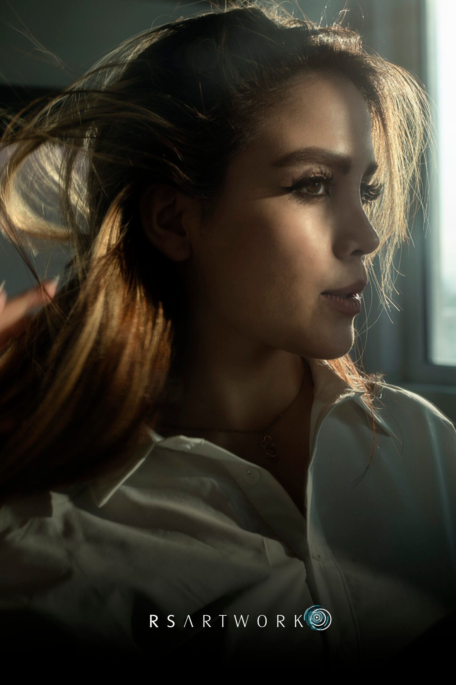 Editorial portrait session, natural window light — photography by Said.